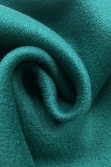 emerald cashmere coating is in a swirl to show body and weight