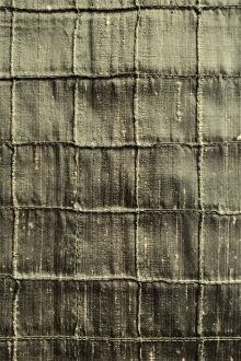 moss colored silk brocade with textured squares