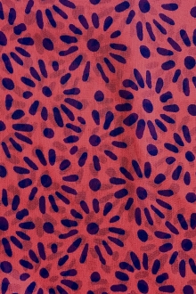 Red silk chiffon with navy floral sunburst pattern