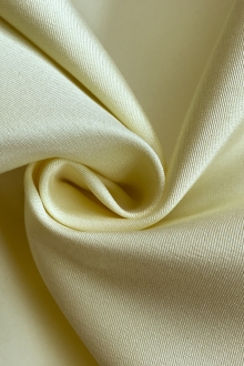 light yellow acetate stretch faille in a swirl