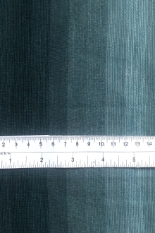 ruler sits on top of silk and acetate knit to show scale of stripes